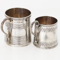 Lot 253 - Two silver mugs.