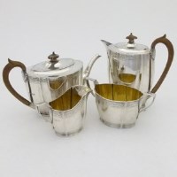 Lot 259 - Silver four piece tea service.