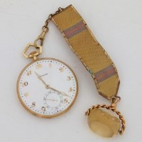 Lot 269 - Movado 18ct gold watch with a gilt fob.