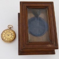 Lot 270 - 18ct gold pocket watch in wood case.