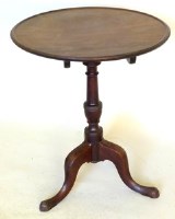 Lot 518 - 19th century mahogany tip-top table