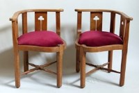 Lot 542 - Pair of Edwardian pale oak Arts & Crafts style corner writing chairs