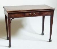 Lot 563 - George III mahogany fold-over tea table