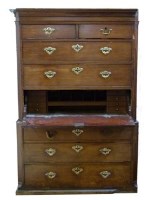 Lot 568 - George III oak secretaire chest on chest