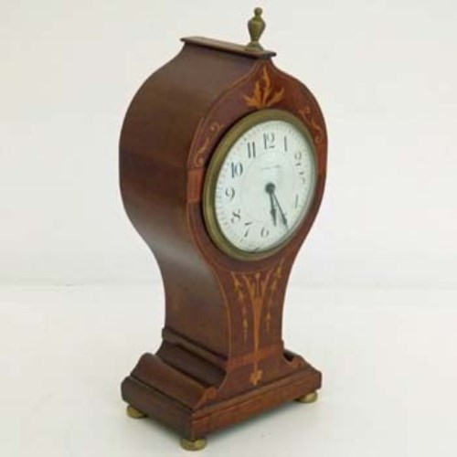 Lot 4 - Edwardian mahogany balloon clock.