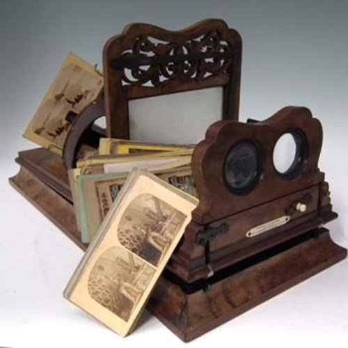 Lot 29 - Walnut Negretti and Zambra stereoscopic slide complete with quantity slides and portable ditto.