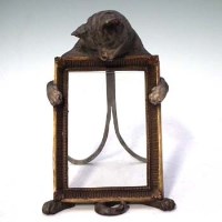 Lot 46 - 19th century cold cast painted photograph frame stamped G.E. Schulzt