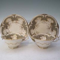 Lot 177 - 19th Century Rockingham pair of coffee cup and saucers Griffin Marks and a crimson ground ewer.