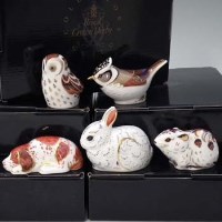 Lot 206 - Five Royal Crown Derby paperweights.