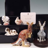 Lot 207 - Five Royal Crown Derby paperweights.