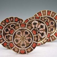 Lot 212 - Two Crown Derby dishes and two plates.