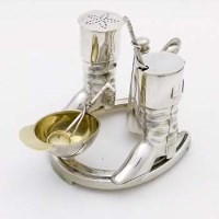 Lot 249 - EPNS condiment hunting boots and cap etc.