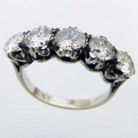Lot 367 - Five-stone white gold diamond ring.
