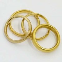 Lot 379 - Three 22ct gold wedding bands and a 9ct band (4)