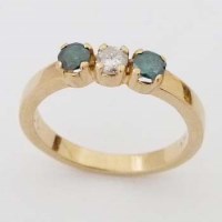 Lot 398 - Three stone white and blue diamond ring, in 18K