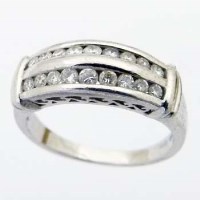 Lot 399 - Platinum and diamond half eternity ring.