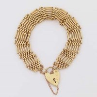 Lot 406 - 9ct gold gate bracelet with padlock clasp.