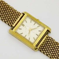 Lot 421 - Omega mans 18ct gold cased wristwatch on 9ct mesh bracelet.