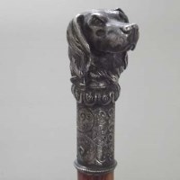 Lot 7 - Silver plated dogs head walking sticks.