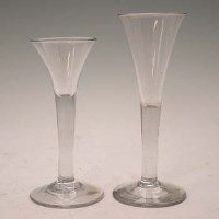 Lot 96 - Two wine glasses with flared bowls.