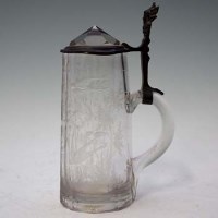 Lot 102 - Cut glass etched lidded tankard