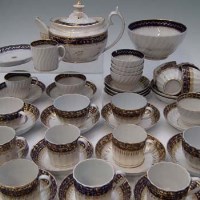 Lot 135 - Quantity blue, white and gilt teawares.