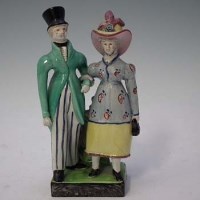 Lot 138 - Staffordshire group of Dandies, circa 1820.