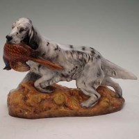 Lot 195 - Royal Doulton English setter and pheasant.
