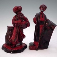 Lot 201 - Royal Doulton flambe The lamp seller and carpet seller.