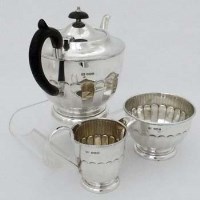 Lot 227 - Three piece silver tea set.