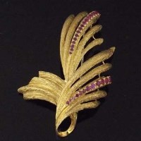 Lot 249 - 18ct Gold and Ruby Leaf Spray Brooch