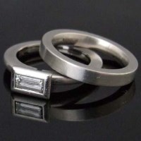 Lot 251 - Platinum and emerald-cut diamond single stone