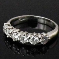 Lot 262 - 18ct white gold seven-stone diamond half hoop