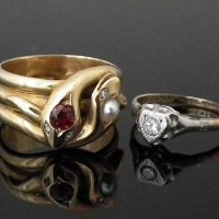 Lot 331 - 18ct gold snake-ring and a heart diamond ring (2).
