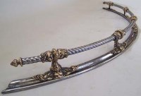 Lot 3 - Polished steel fender.