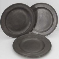 Lot 5 - Three large pewter plates.