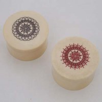 Lot 26 - Two ivory circular lidded pots.