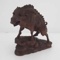 Lot 31 - Carved black forest boar signed N. Denefe.