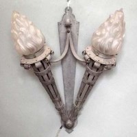Lot 32 - Three light (mounts) with six glass bulbs, three wood (mounts) batons.