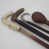 Lot 46 - Four walking sticks.