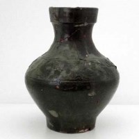 Lot 118 - Green glazed terracotta hu vase, Han dynasty