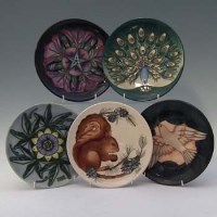 Lot 168 - Five Moorcroft year plates.