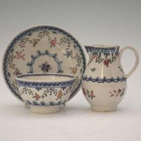 Lot 226 - Liverpool Pennington’s cream jug and a tea bowl and saucer.