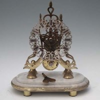 Lot 14 - Brass skeleton clock and dome.