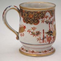 Lot 100 - Ironstone tankard.