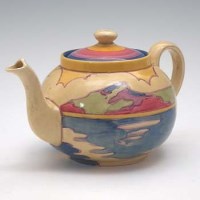 Lot 162 - Clarice Cliff tea pot.