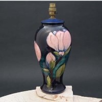 Lot 187 - Moorcroft magnolia lamp base.