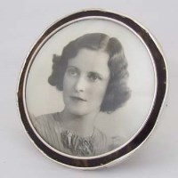 Lot 228 - Silver and tortoiseshell photo frame.