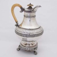 Lot 247 - Silver hot water jug on burner.