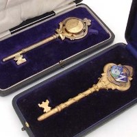 Lot 256 - Silver gilt key and a gilt metal key (2).
